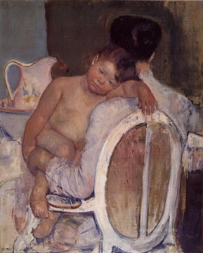 seated man holding a branch Painting - Mother Holding a Child in Her Arms mothers children Mary Cassatt